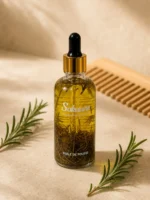 Huile de pousse cheveux au romarin Sokoune avec branches de romarin